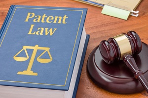 patent law book with a gavel