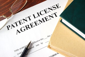 patent license agreement on a table