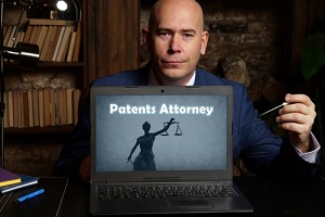 patents attorney with phrase on laptop