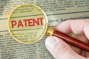 searching patent with magnifying glass